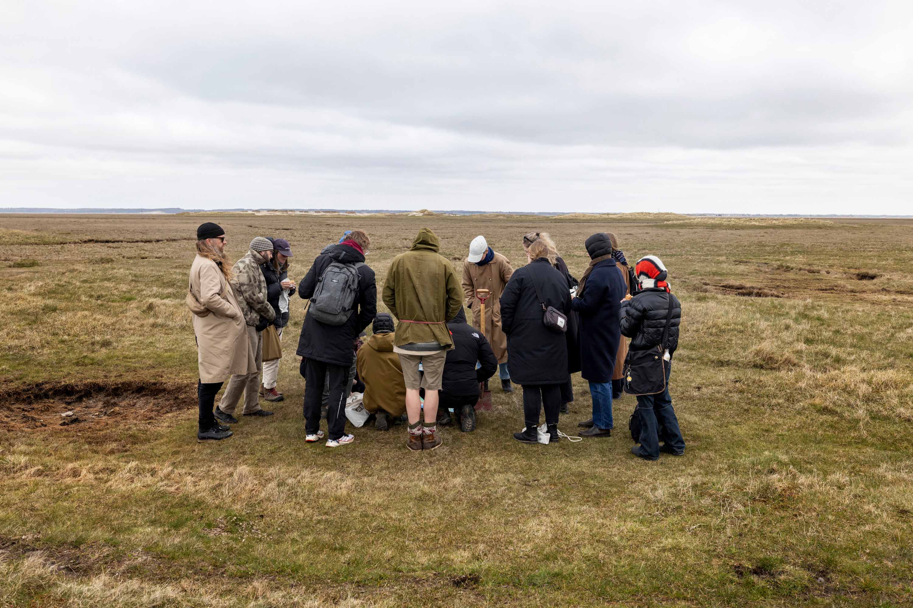 People gathered on Wadden Sea landscape